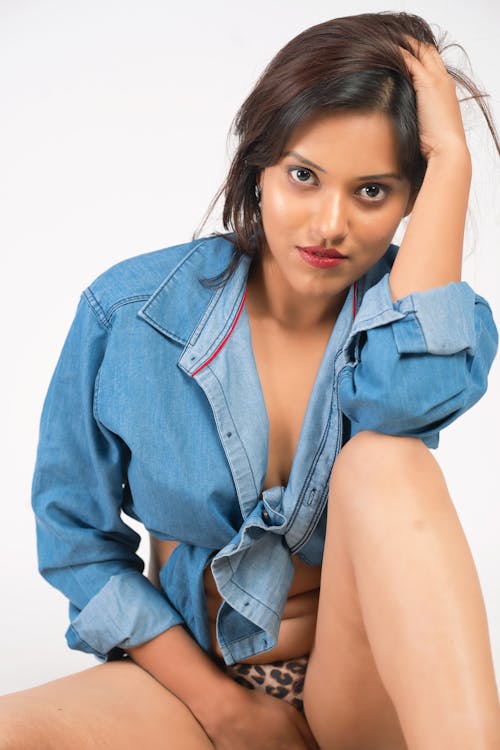 Free Woman in Blue Denim Jacket Posing Stock Photo