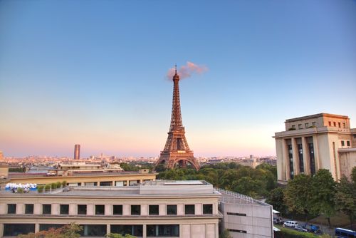 Free Stunning view of the Eiffel Tower at sunrise in Paris, showcasing iconic architecture. Stock Photo