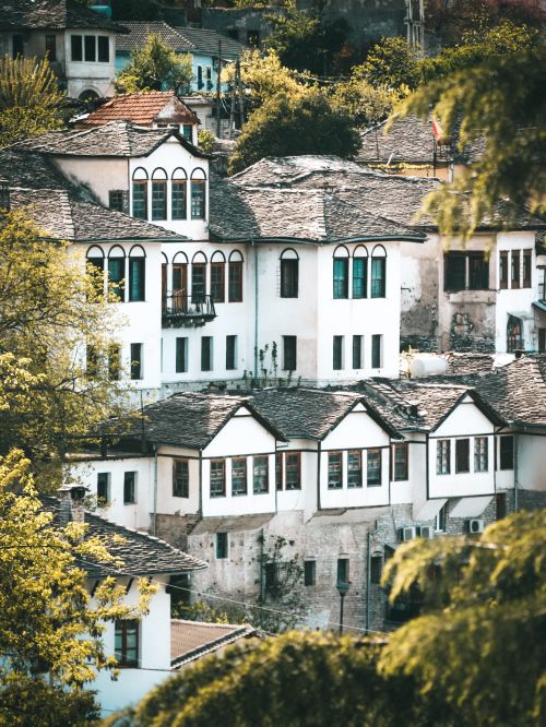 Free Charming view of traditional stone houses in Gjirokaster, a UNESCO World Heritage site in Albania. Stock Photo