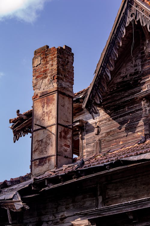 An old broken house in need of chimney repair