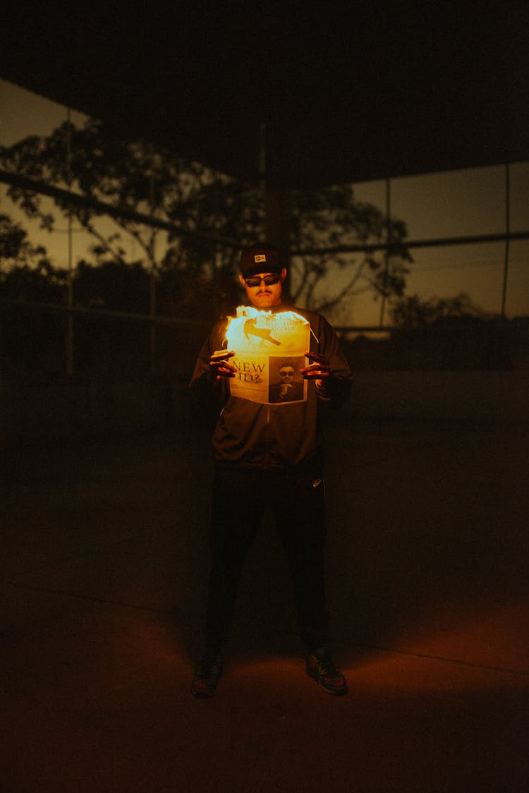 Man With Burning Newspaper