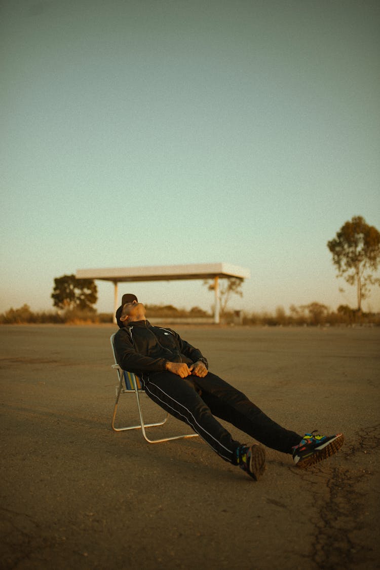 Man Relaxing On Chair