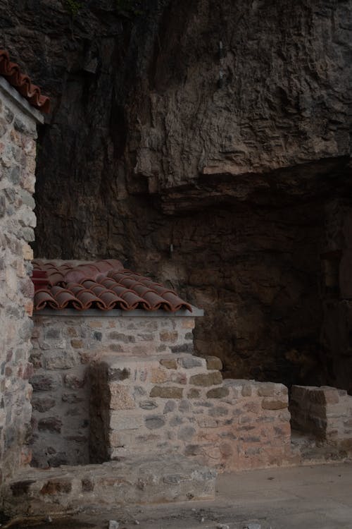 Stone Walls Under a Cliff