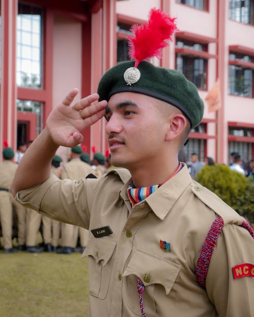 Young Soldier in a Uniform Saluting 