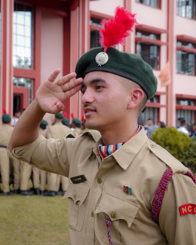 Young Soldier In A Uniform Saluting 