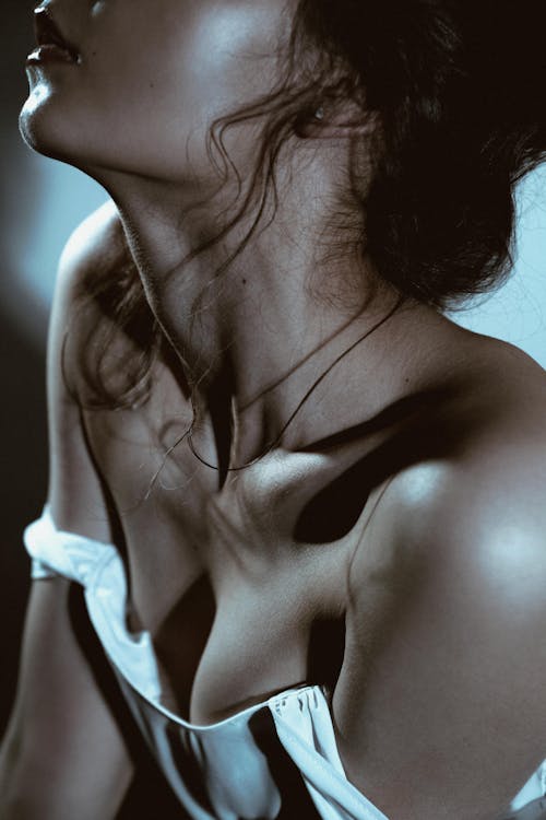 Sensual Picture of a Woman Wearing Her Top Straps Down 