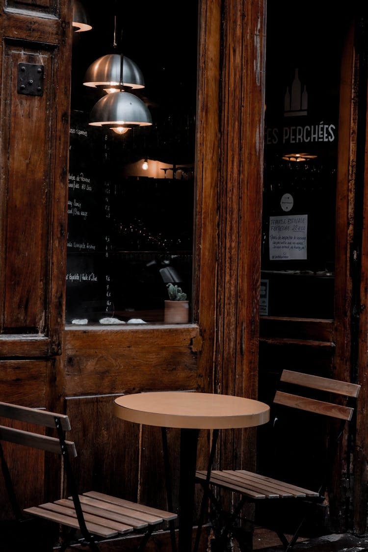 A Table And Chairs In A Café