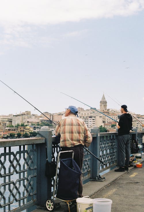 Men Fishing from the Bridge