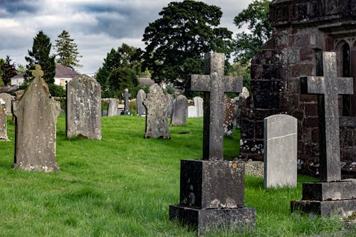 Free Tombstone of Graves in the Graveyard Stock Photo