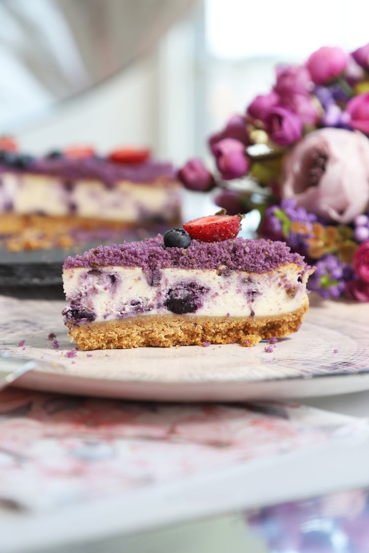 Close-up Of A Slice Of A Cake With Cream And Fruit 