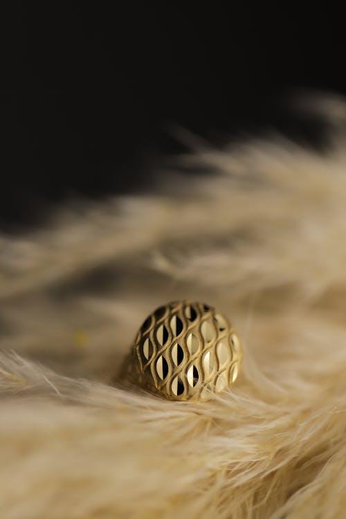 Close Up Photo of a Gold Ring