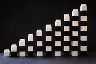 Pile of White and Black Boxes
