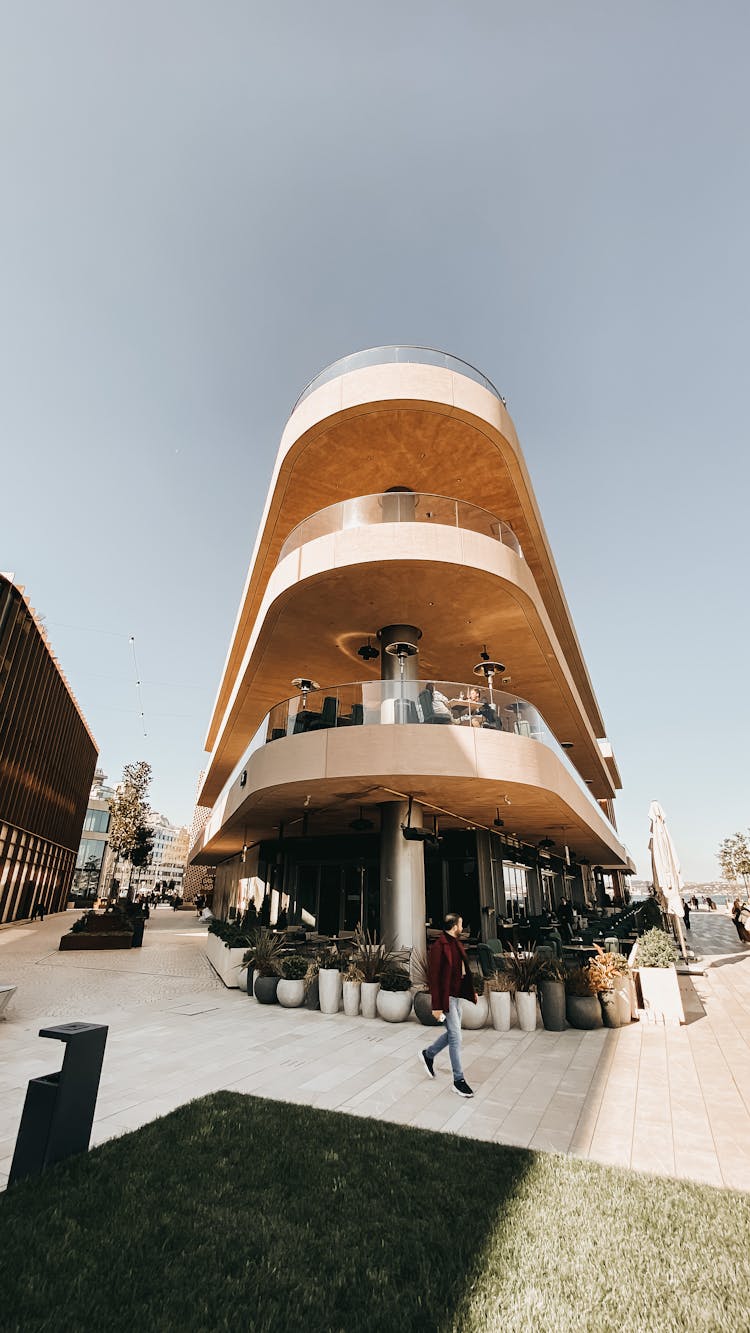 Modern Architectonic Project Visualization Of A Round Building With Balconies