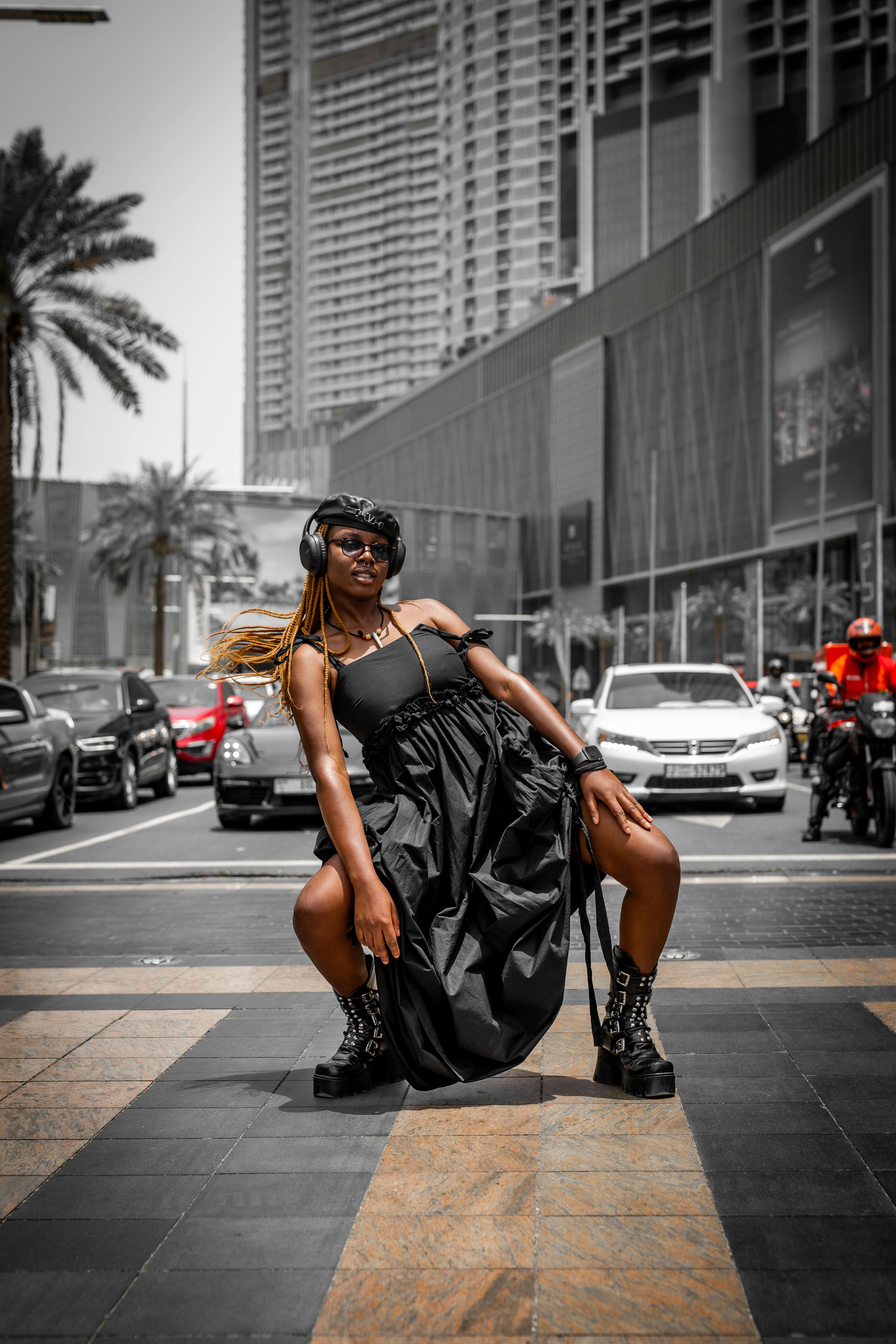 Woman Posing in Black Dress on a Beach · Free Stock Photo