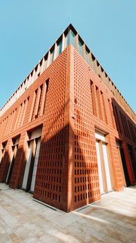Detailed view of modern brick building in Istanbul on a sunny day, showcasing contemporary urban architecture.