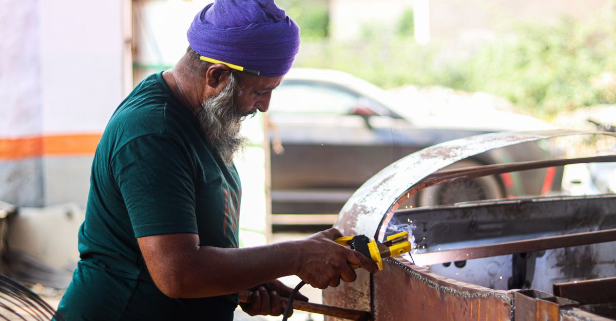 Man Using Wielding Machine A Man Using Welding Machine · Free Stock Photo