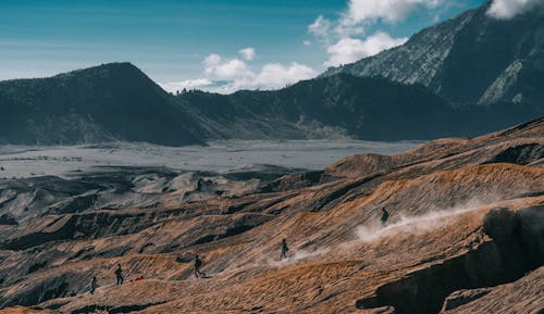 Free Group of People Hiking in the Mountain Stock Photo