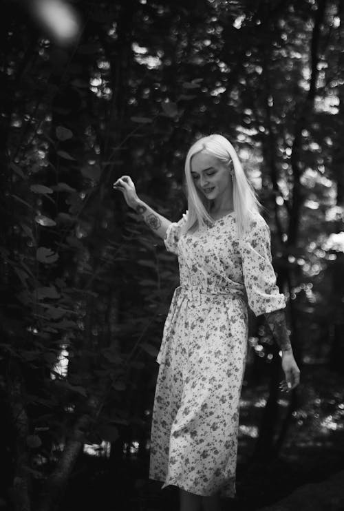 Grayscale Photo of Woman in Floral Dress