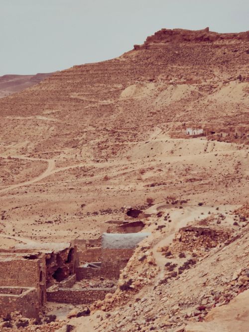 Free Explore the ancient desert landscape and ruins of Douiret in Tataouine, Tunisia under the warm sun. Stock Photo