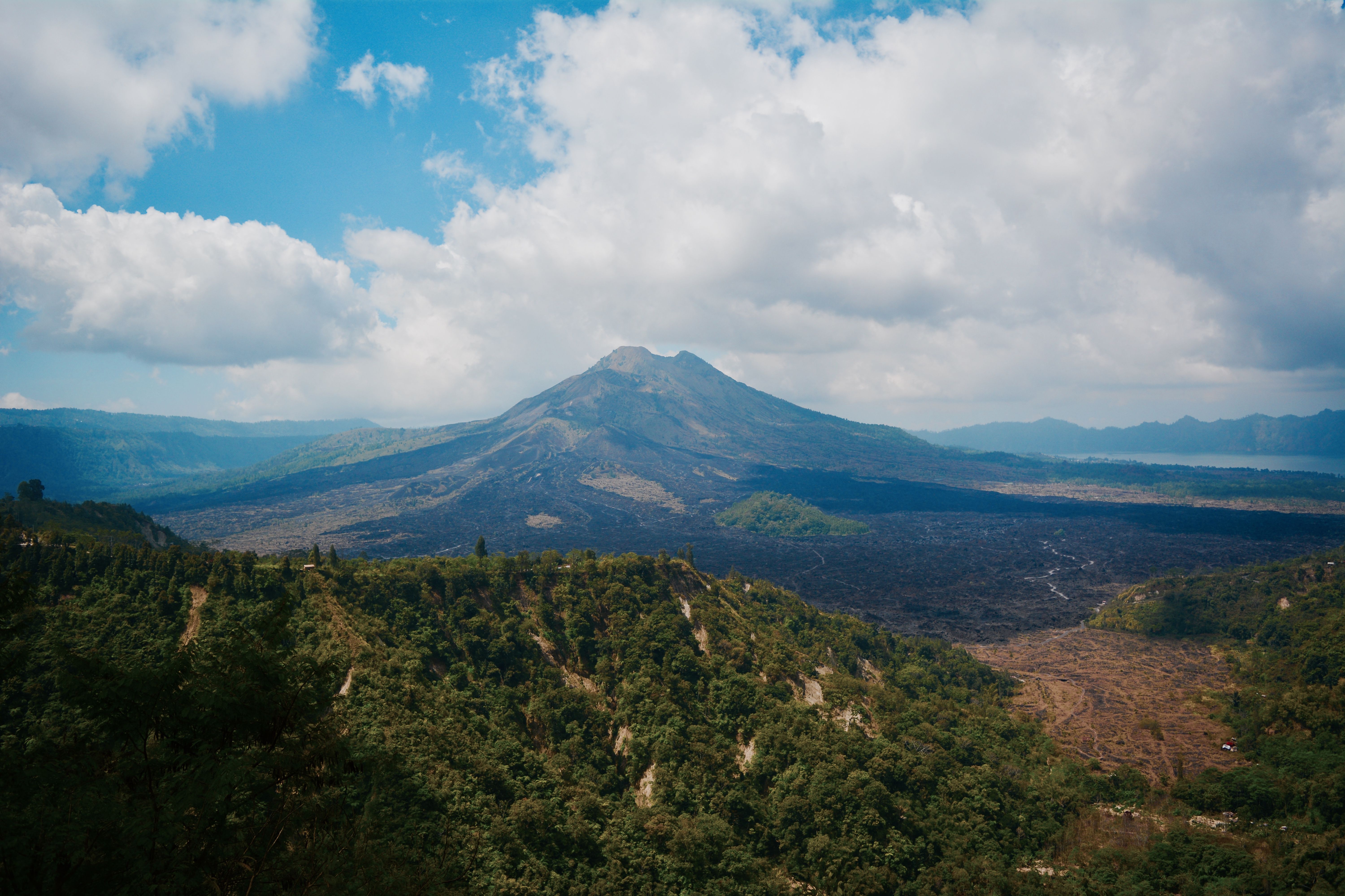 Aerial View of Mountain Under White Clouds · Free Stock Photo