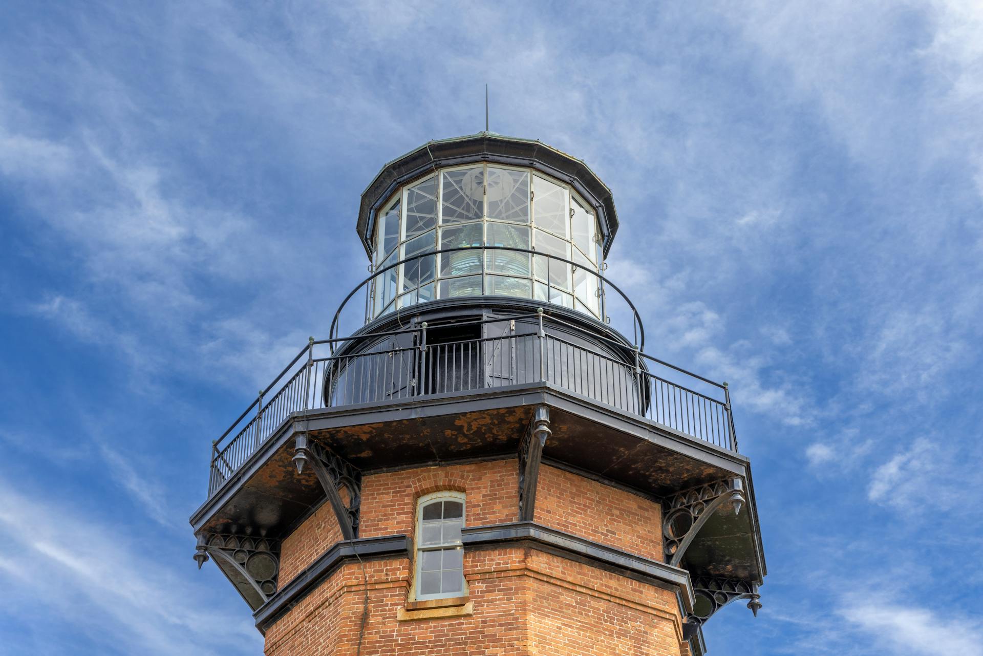 Low angle view of Block Island North Light against clear blue skies in New Shoreham, Rhode Island.