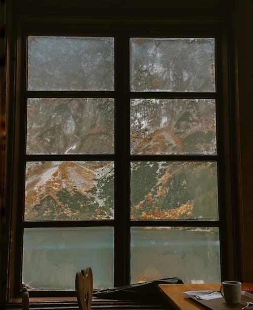 View from a Window on Mountains and a Lake