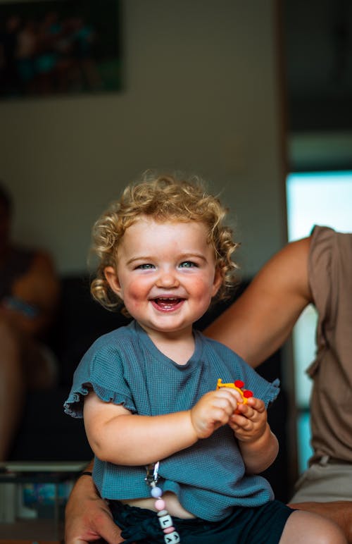 Toddler with Curly Hair Smiling