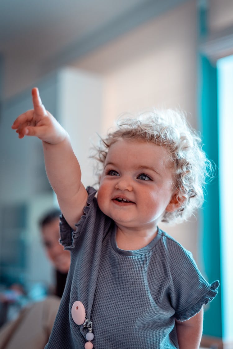 Adorable Baby Pointing Her Finger 