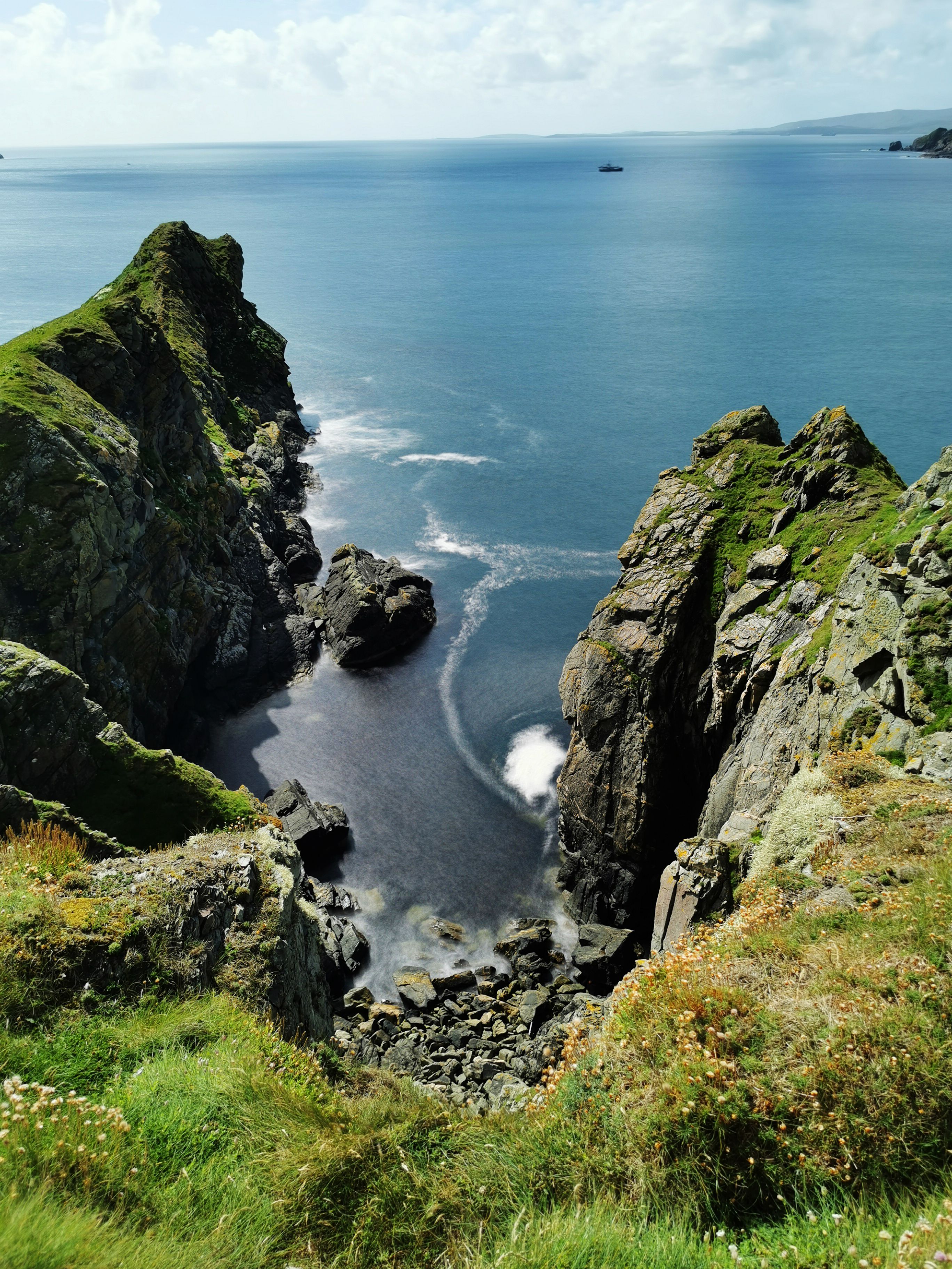 Rock Formation Beside Blue Sea · Free Stock Photo