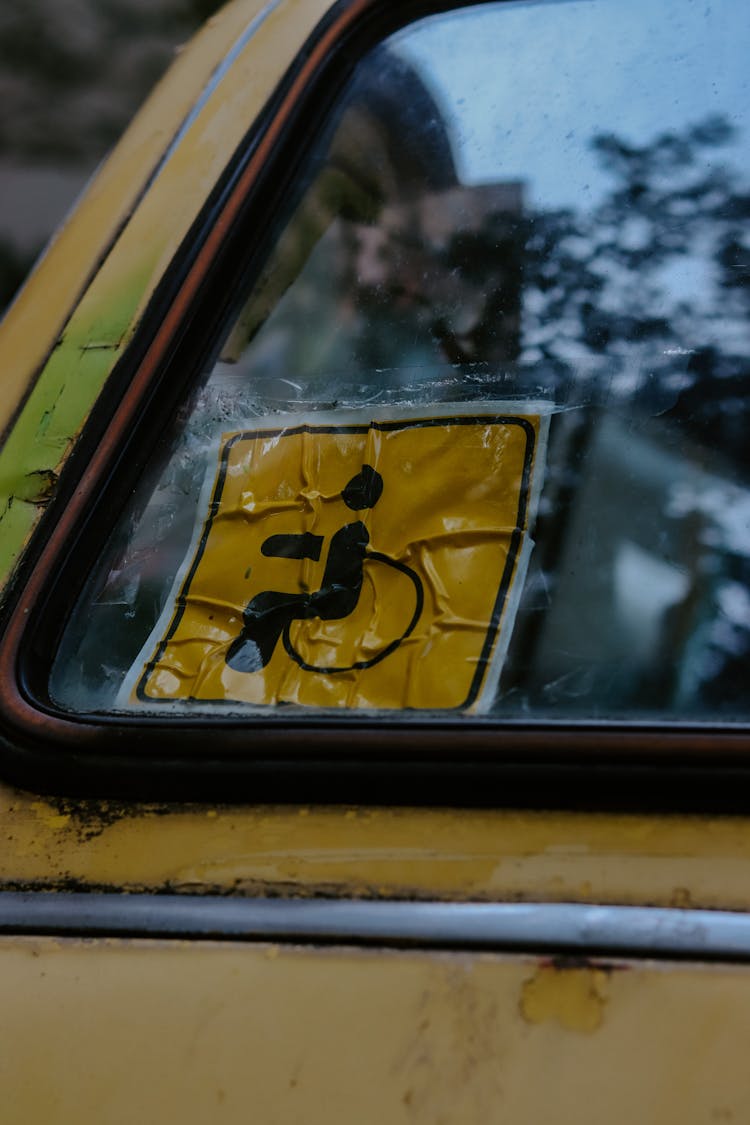 A Yellow Sticker On The Windshield