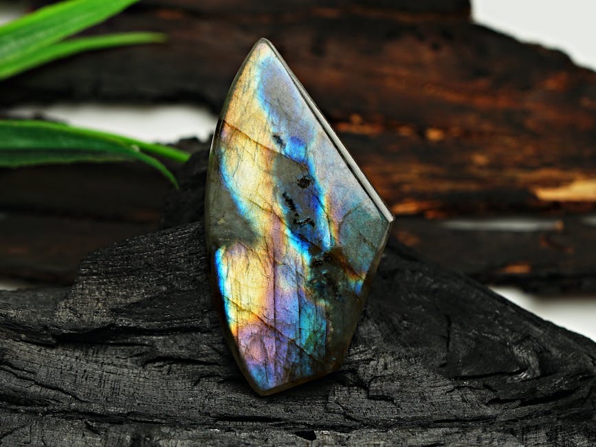 Iridescent labradorite gemstone displaying vibrant blue and green flash