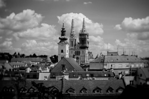 Free Black and white photo showcasing Zagreb Cathedral with cloudy sky in the background. Stock Photo