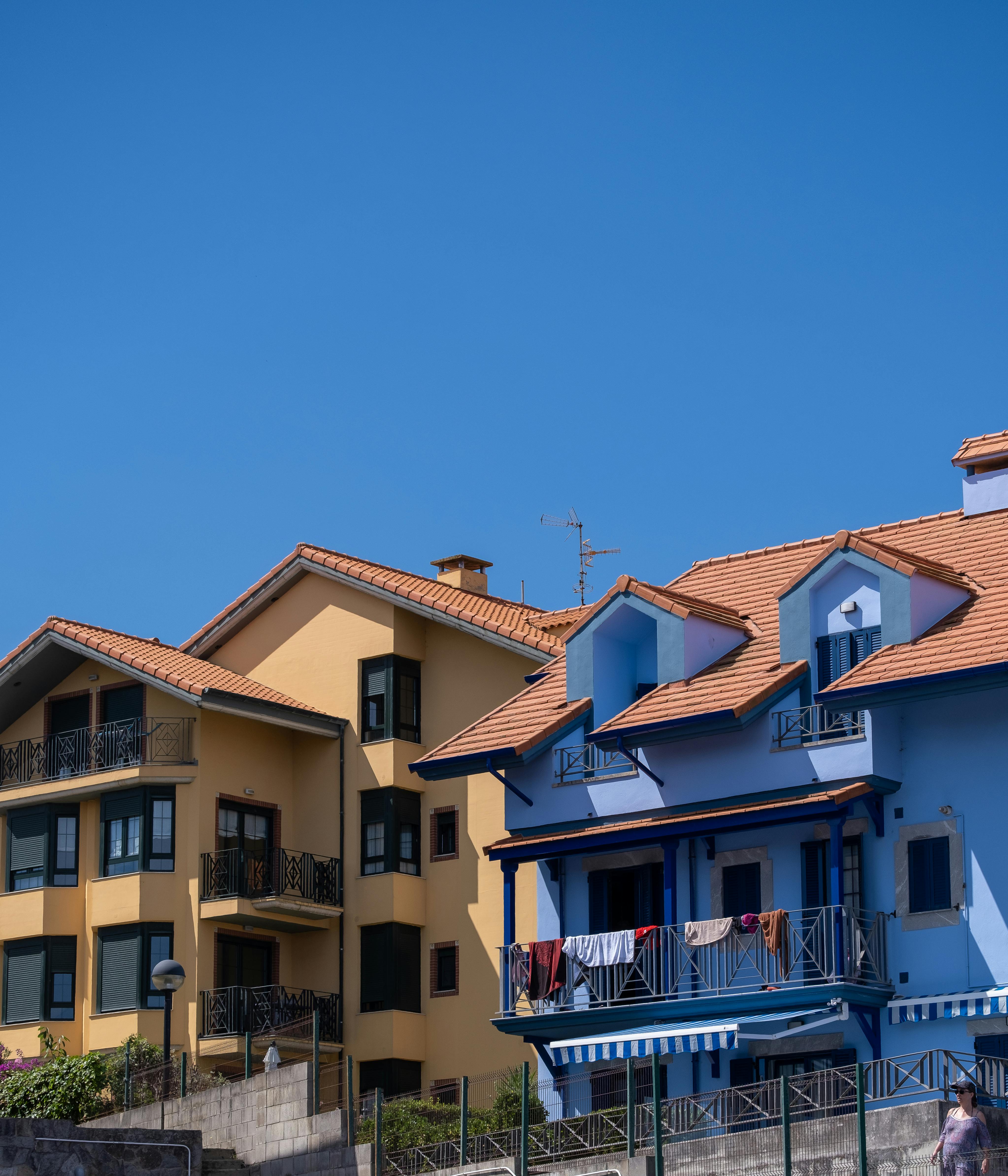 Yellow Houses With Blue Trim