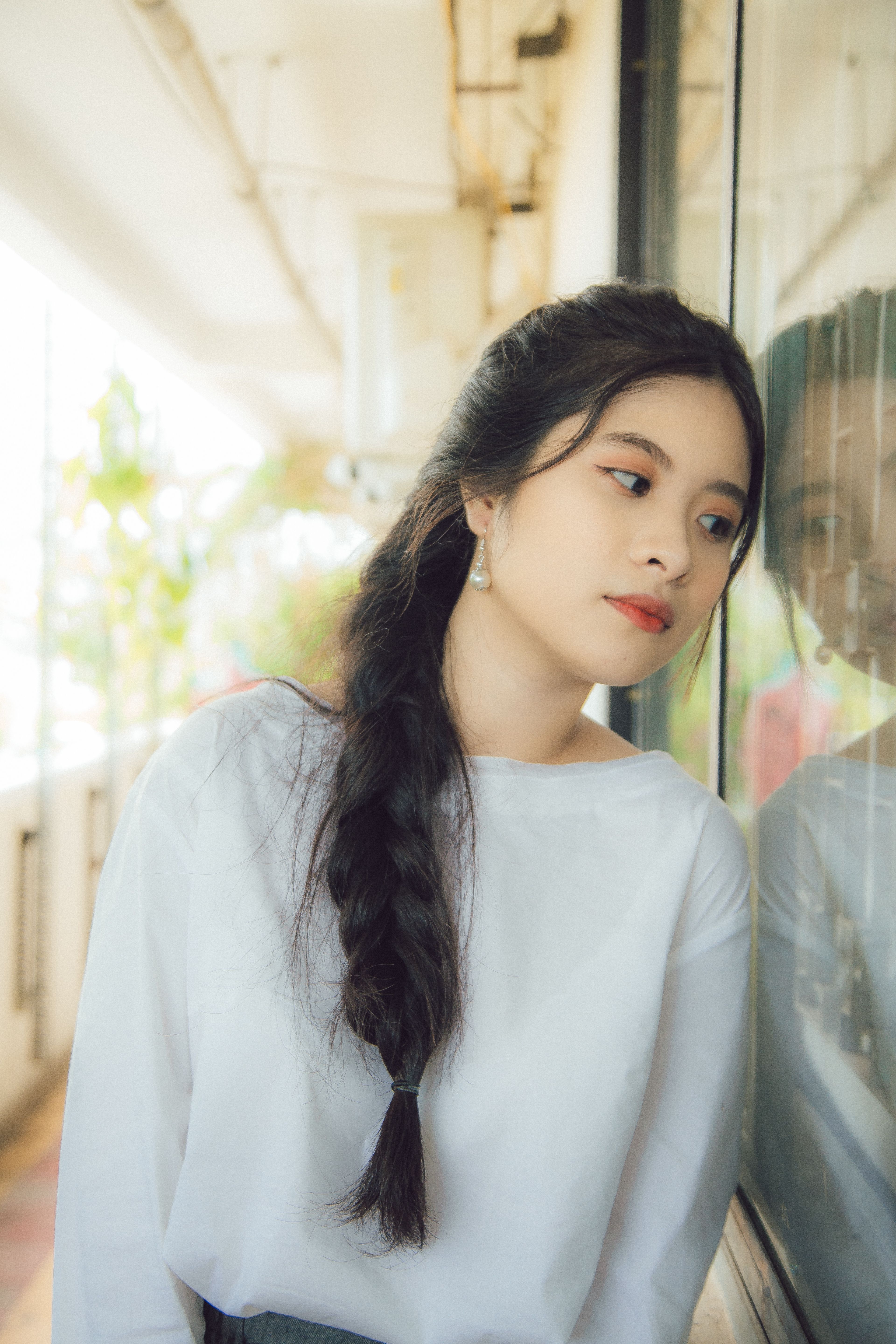 A Woman in White Long Sleeve Shirt · Free Stock Photo