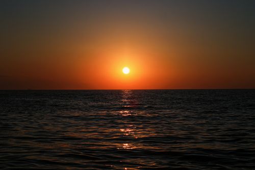 Free Captivating ocean sunset with vibrant colors over the Black Sea in Odesa, Ukraine. Stock Photo