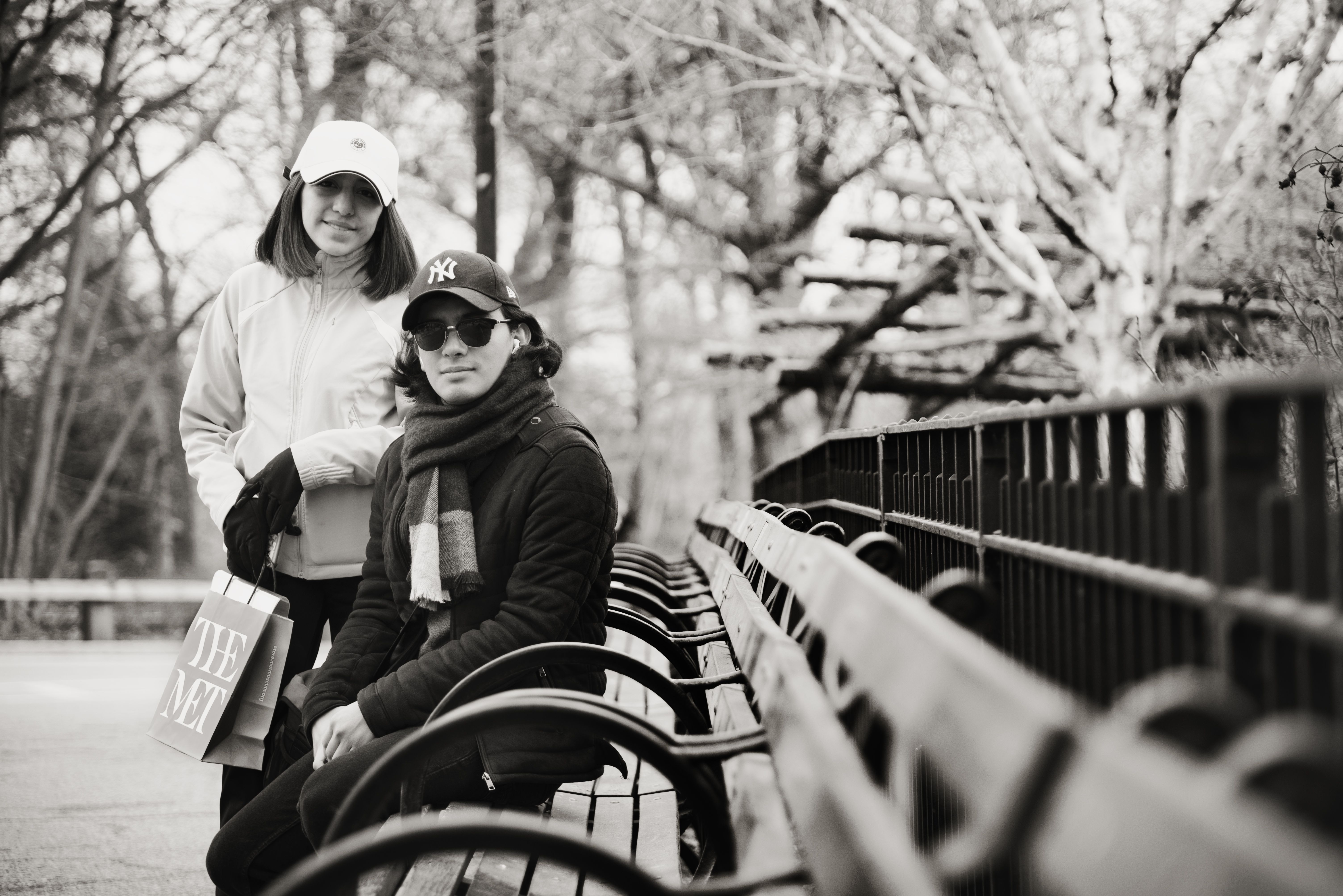 A couple enjoys a moment on a bench in Central Park, New York City.