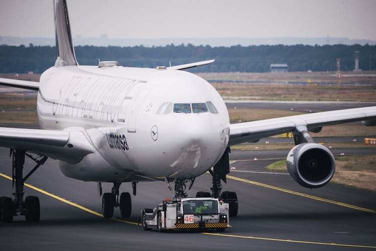 White Passenger Plane On Airport