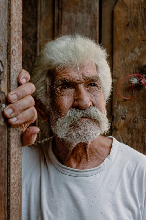 Close Up Photo of an Elderly Man with Beard