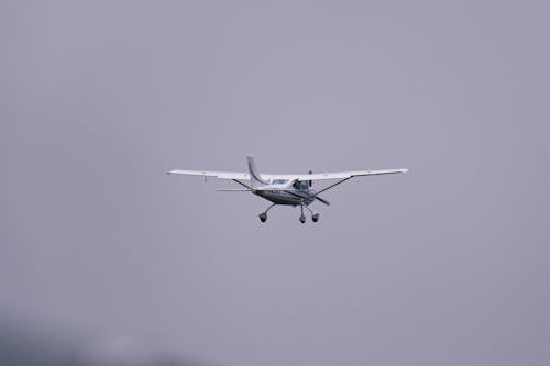 White Airplane Flying in the Sky