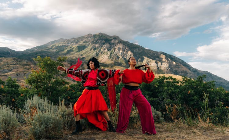 Women Posing In Mountains On A Fashion Photoshoot 