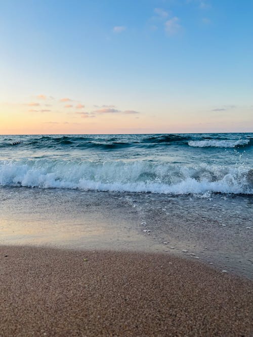 Free Waves Crashing on a Shore Stock Photo