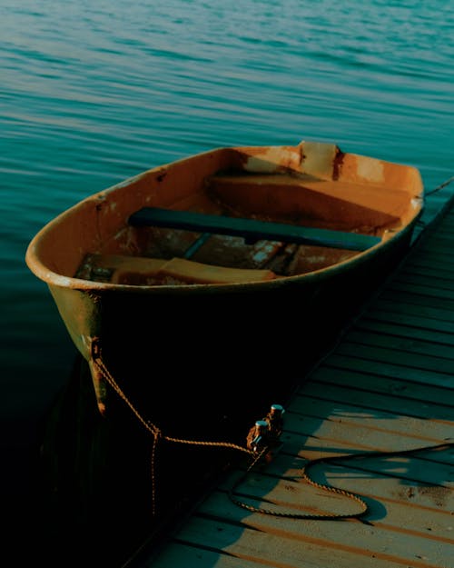 Close-Up Shot of a Boat on Wooden Dock