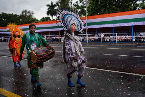 Free Vibrant cultural parade in Kolkata, featuring traditional costumes and performers on Independence Day. Stock Photo