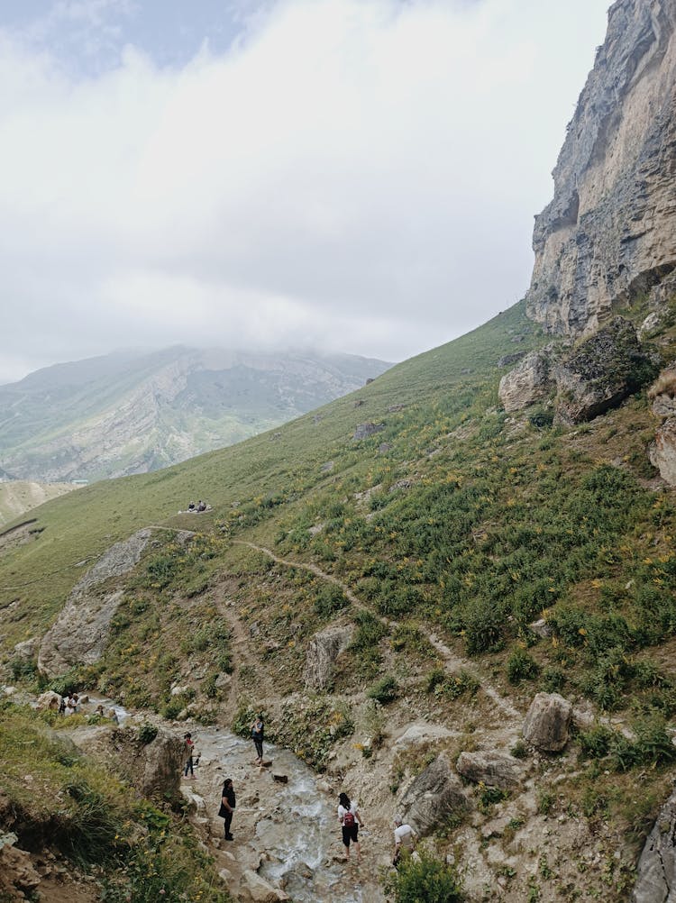 Aerial Photography Of People Walking On The Trail 