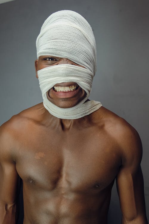A Man with Bandage on His Face