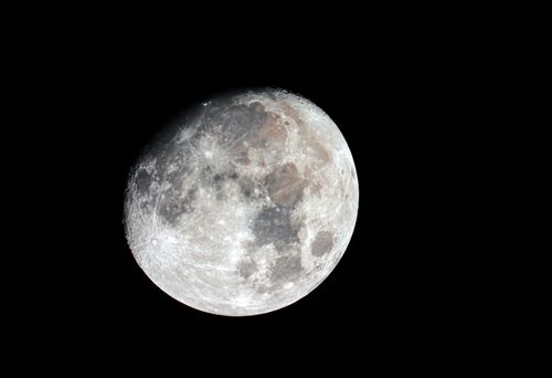 Free Crisp and detailed close-up of the full moon set against a dark night sky. Stock Photo
