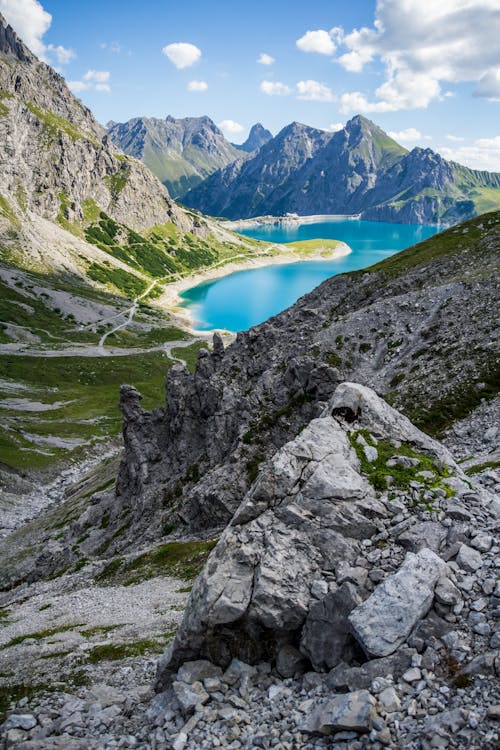 Kostnadsfri bild av bergskedja, blå sjö, dal