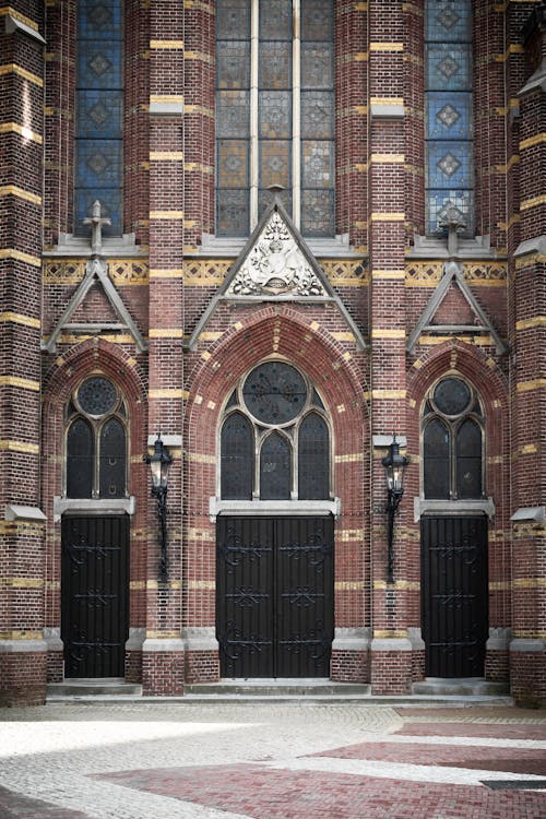 Brown Brick Building With Black Metal Doors