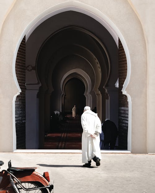Man Walking to a Madrasa