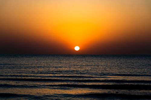 Free Stunning sunset view over the Caspian Sea, capturing serene waves and golden hues. Stock Photo